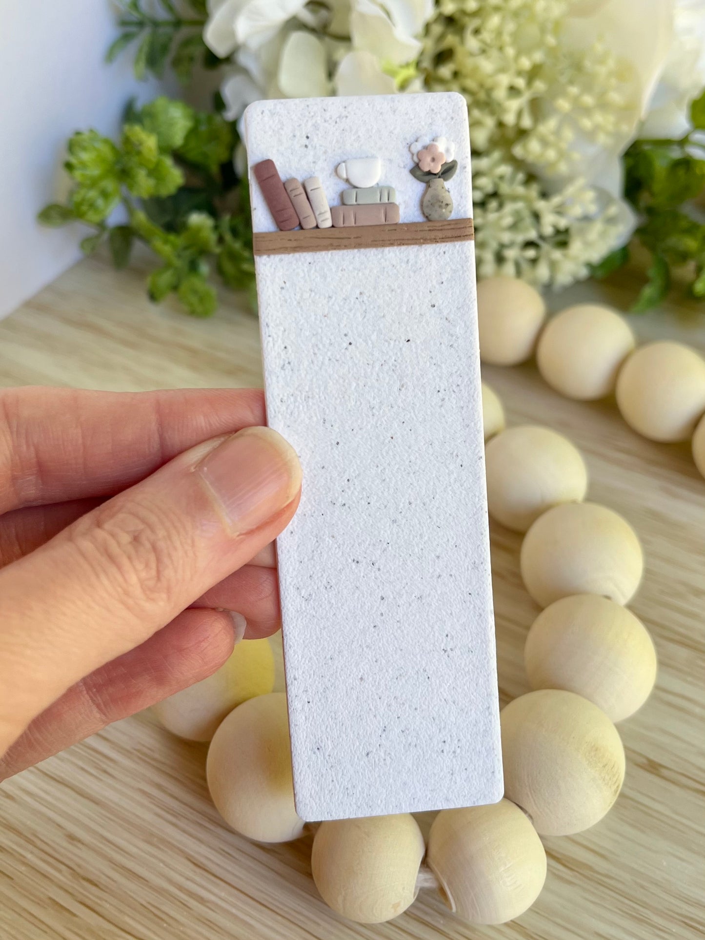 Book Stack with Coffee Mug on Bookshelf Bookmark