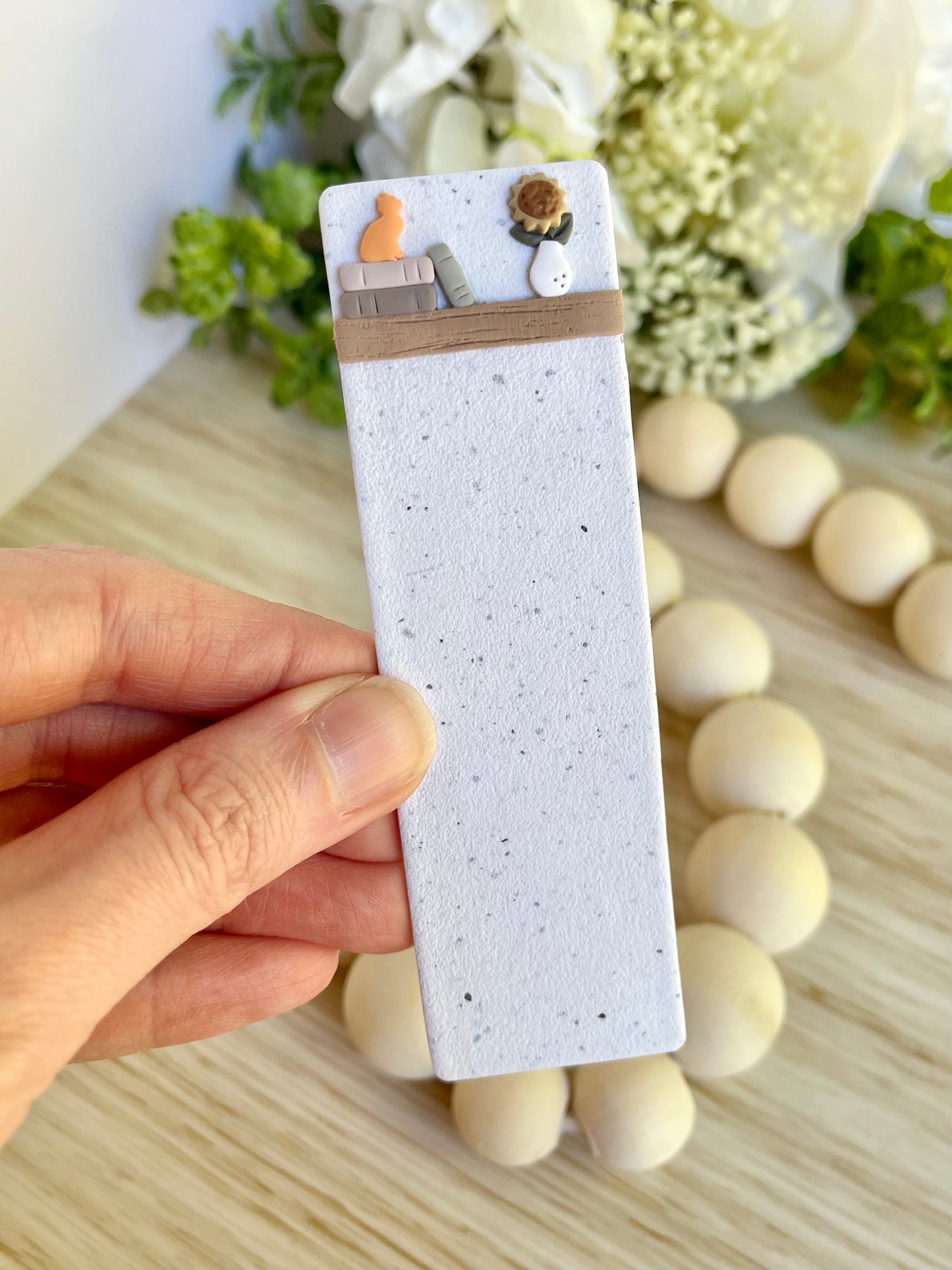 Book Stack with Orange Cat and Sunflower Bookmark