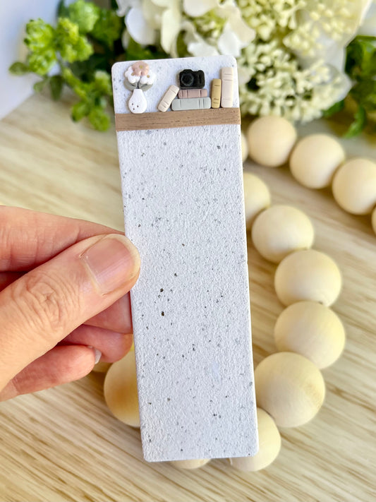 Book Stack with Camera and Flower Vase Bookmark